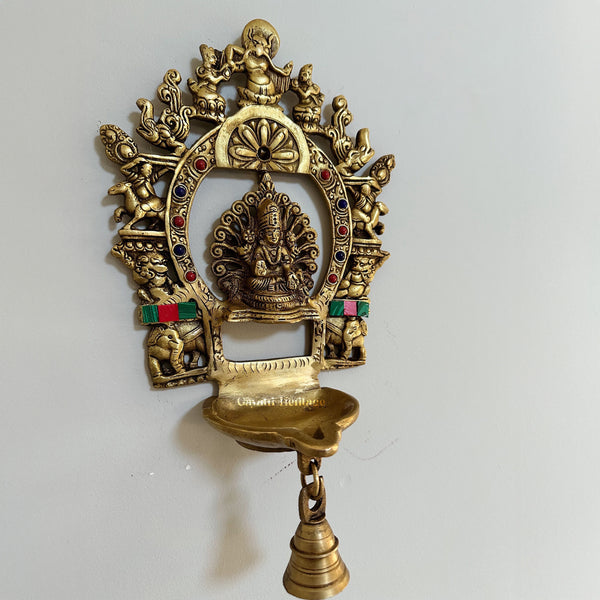 Brass Laxmi Diya with Prabhavali Frame – Illuminate Your Space with Prosperity and Divine Grace | Gayatri Heritage