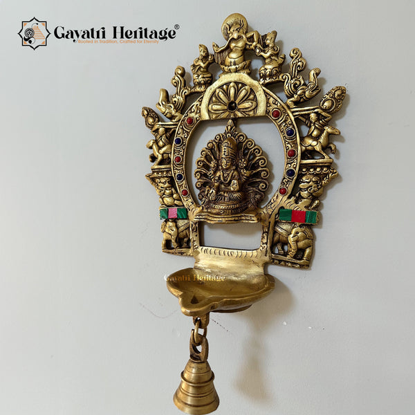 Brass Laxmi Diya with Prabhavali Frame – Illuminate Your Space with Prosperity and Divine Grace | Gayatri Heritage