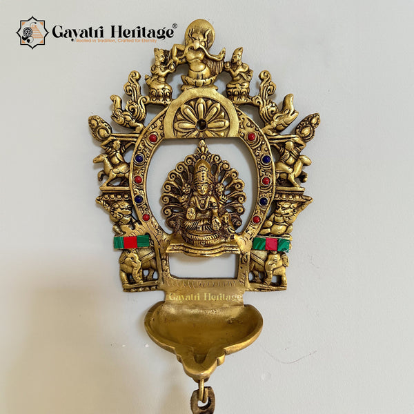 Brass Laxmi Diya with Prabhavali Frame – Illuminate Your Space with Prosperity and Divine Grace | Gayatri Heritage