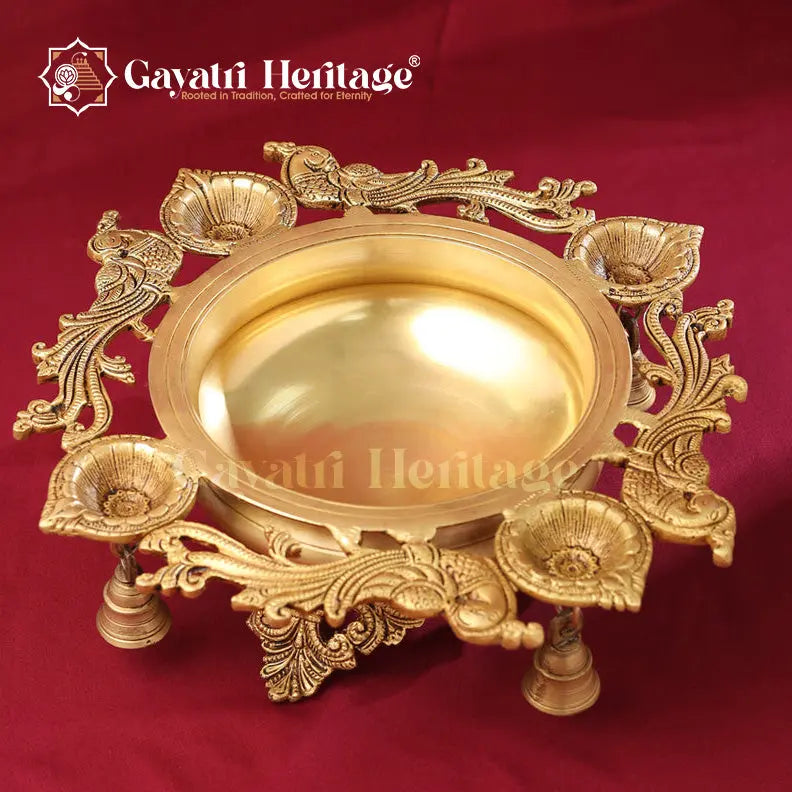 Brass Peacock Urli with Bell – Elegant Traditional Centerpiece | Gayatri Heritage Gayatri Heritage