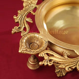 Brass Peacock Urli with Bell – Elegant Traditional Centerpiece | Gayatri Heritage Gayatri Heritage