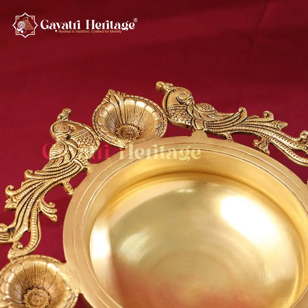 Brass Peacock Urli with Bell – Elegant Traditional Centerpiece | Gayatri Heritage Gayatri Heritage