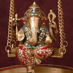 Brass Ganesh Urli with Swing | Stone Studded Golden Flower Floating Bowl | Lord Ganesha Jhula Decor