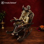 Brass Ganesha Idol Reading Book on Rocking Chair | Antique Finish Statue